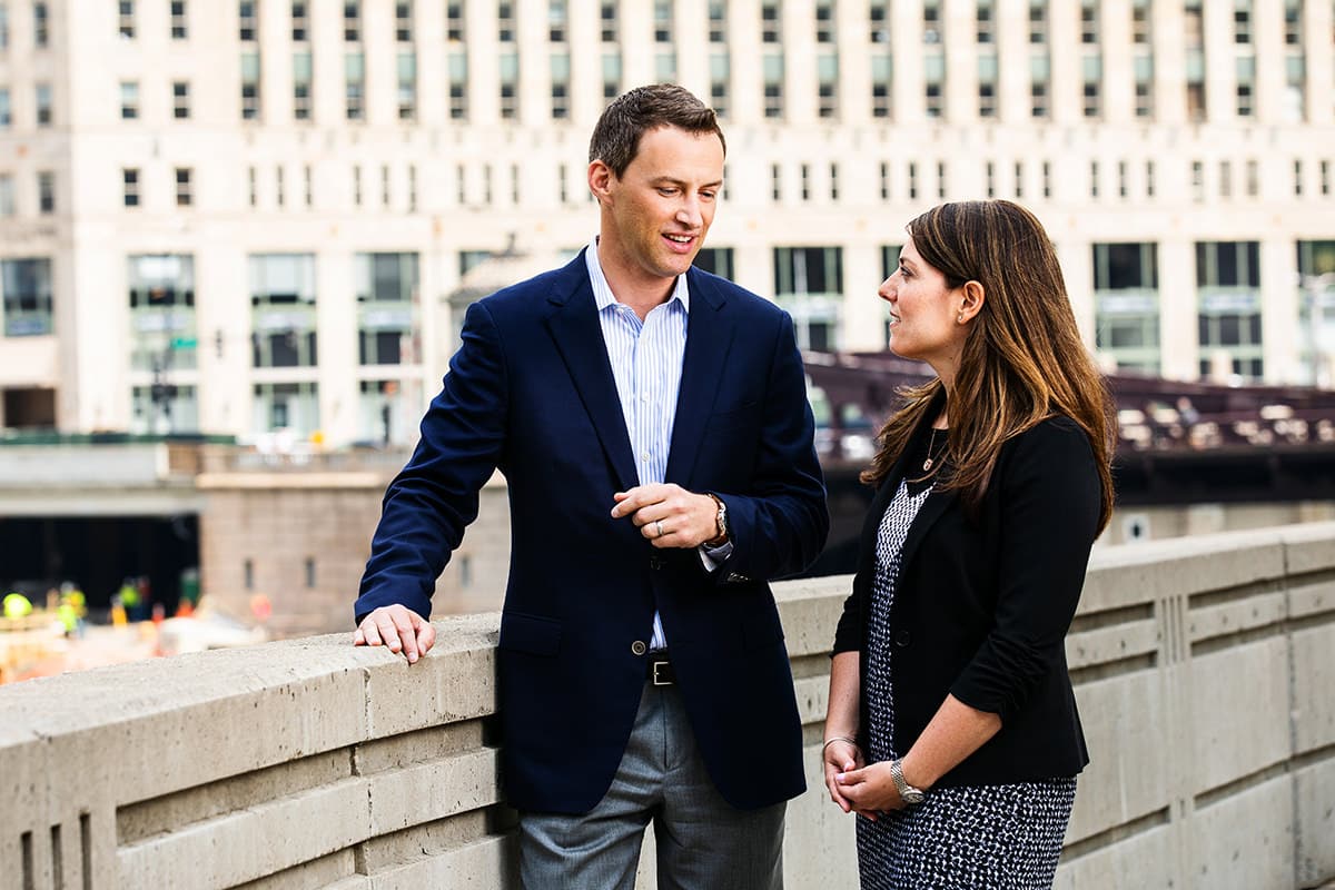 Business professionals networking outdoors, captured for Chicago business photography to convey approachability and connection.