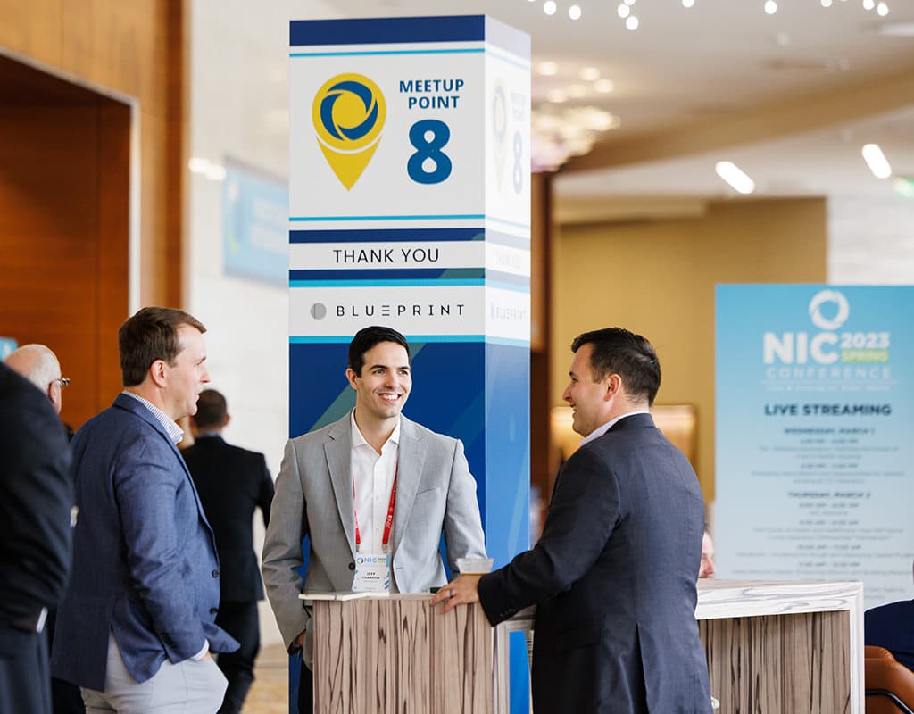 Attendees networking during a Chicago business event, photographed by Chicago corporate event photographer Tori Soper.