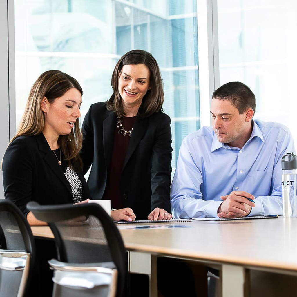 Chicago business photography of team working together in office setting