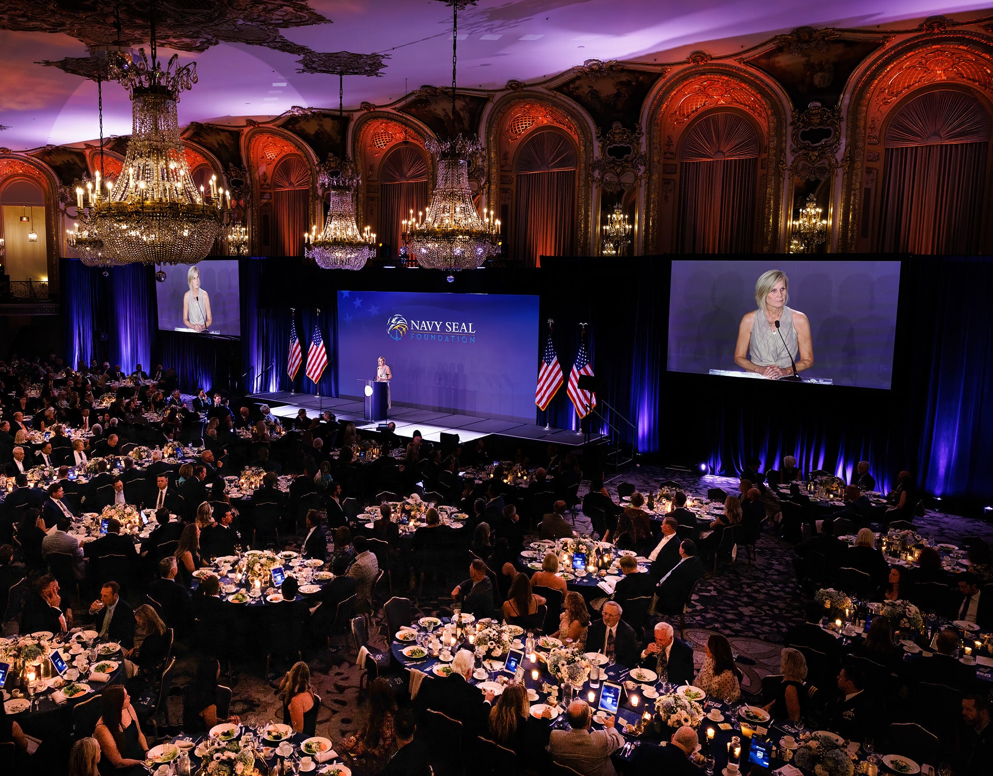 Chicago corporate event photography at Navy SEAL Foundation gala with keynote stage and ballroom audience