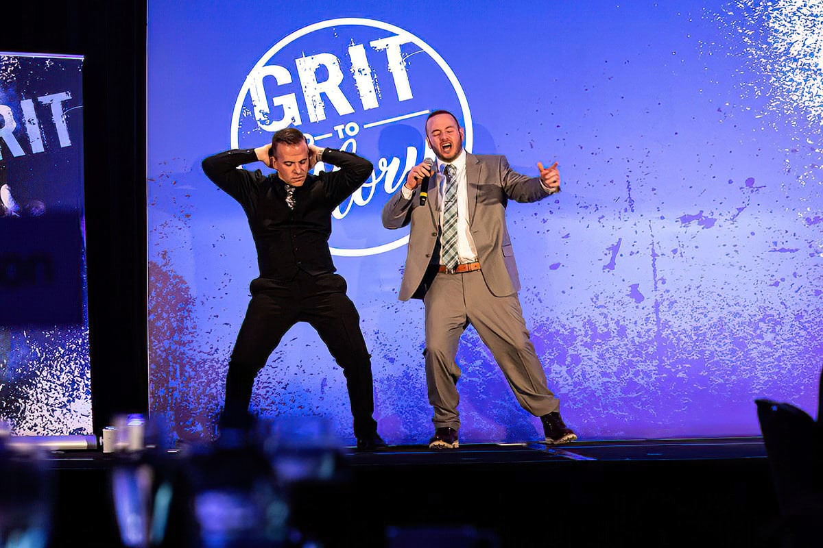 Event photography coverage of an entertainer performing during a Chicago corporate event.