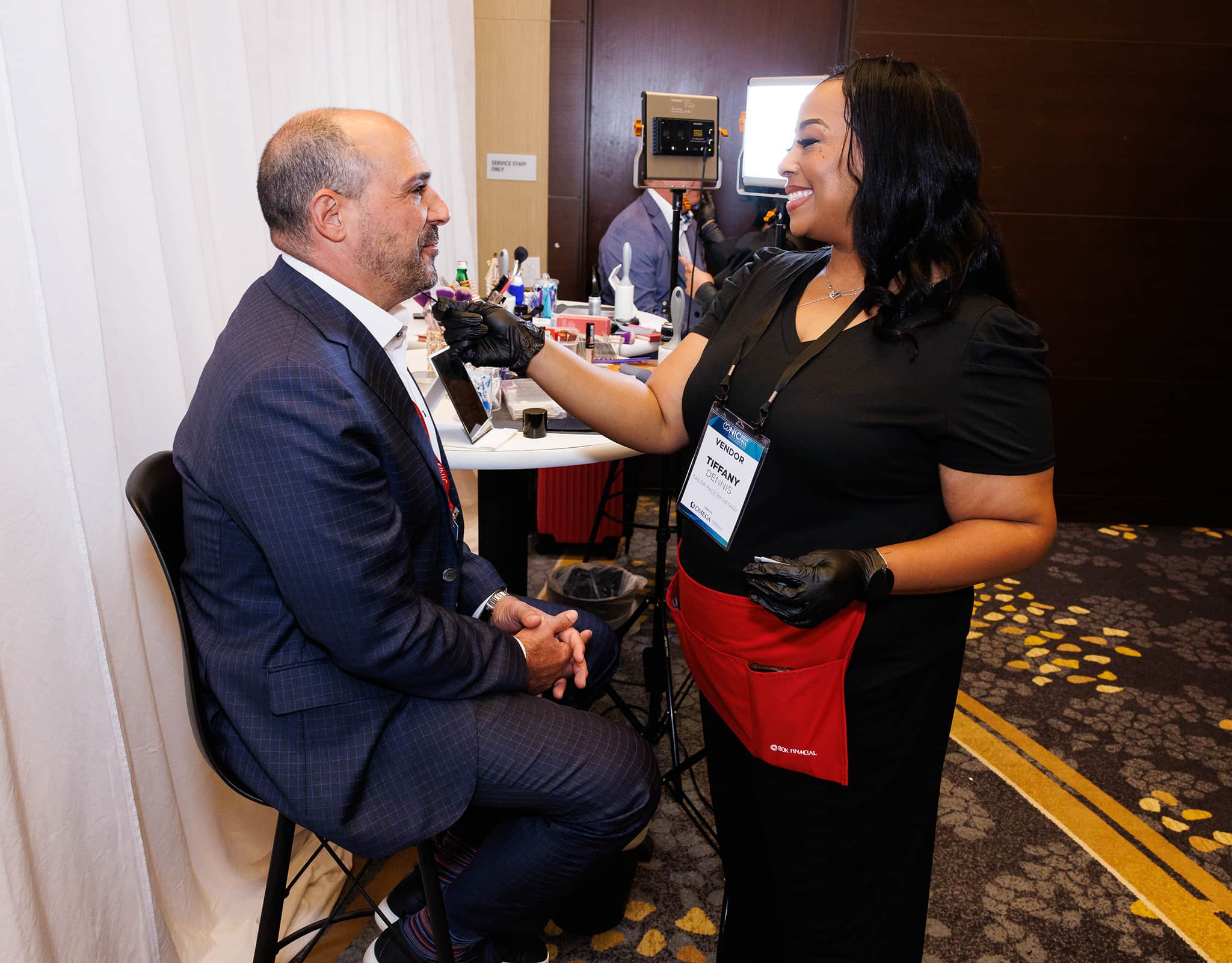 Corporate attendee photographed during a Chicago Headshot Lounge session at a live event.