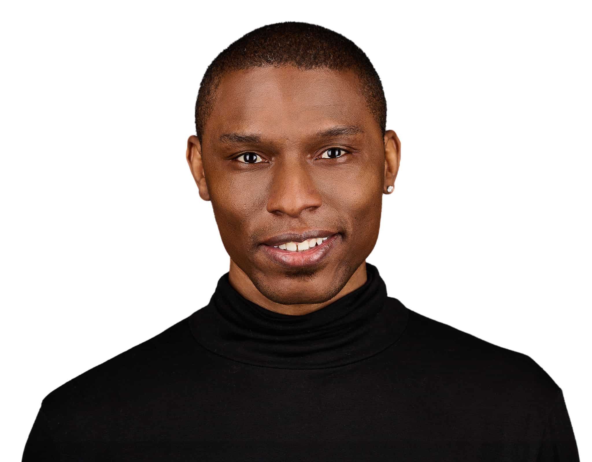 Modern executive headshot created at a Chicago Headshot Lounge with dark backdrop and professional lighting.