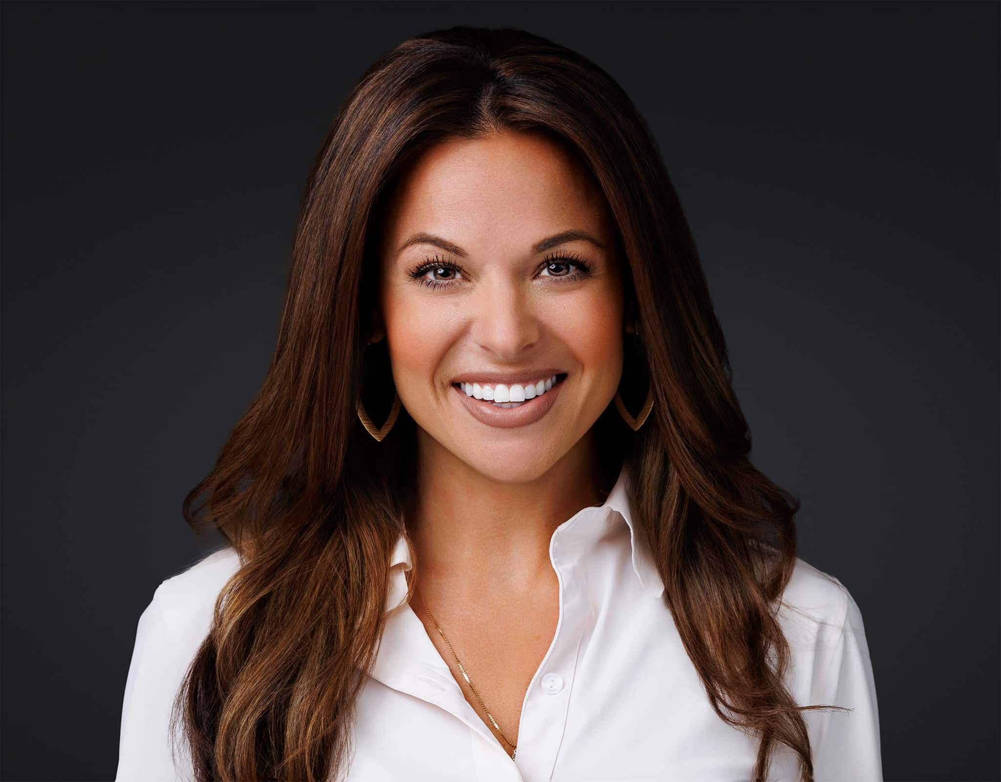 Professional headshot captured at a Chicago Headshot Lounge session with clean white background and studio lighting.