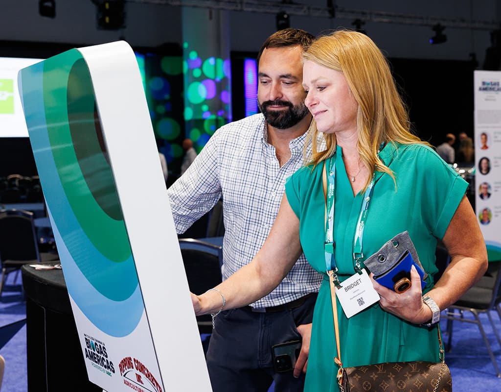 Attendee engaging with an interactive brand activation, photographed by Chicago corporate event photographer Tori Soper.