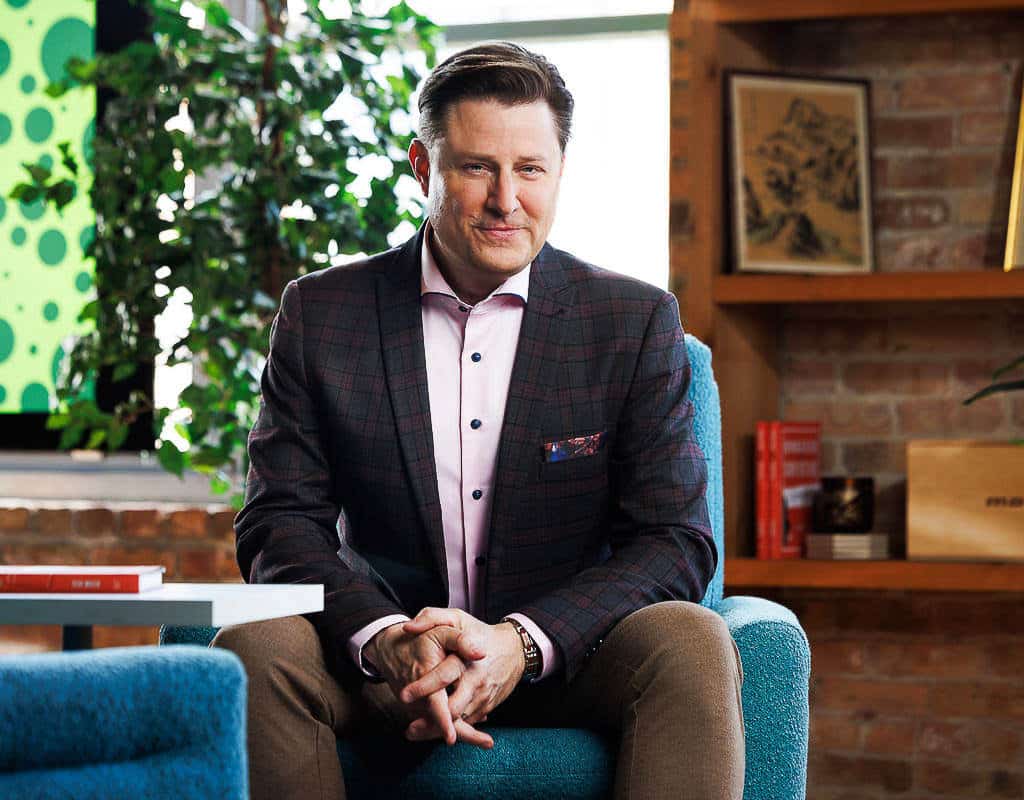 Corporate environmental portrait of a professional in a stylish office setting