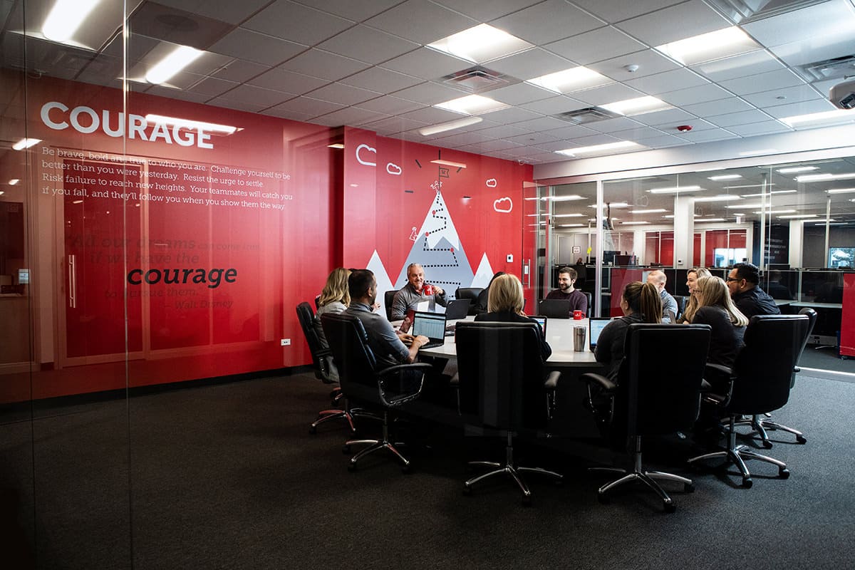 Corporate lifestyle photography of a team meeting in a modern corporate conference room