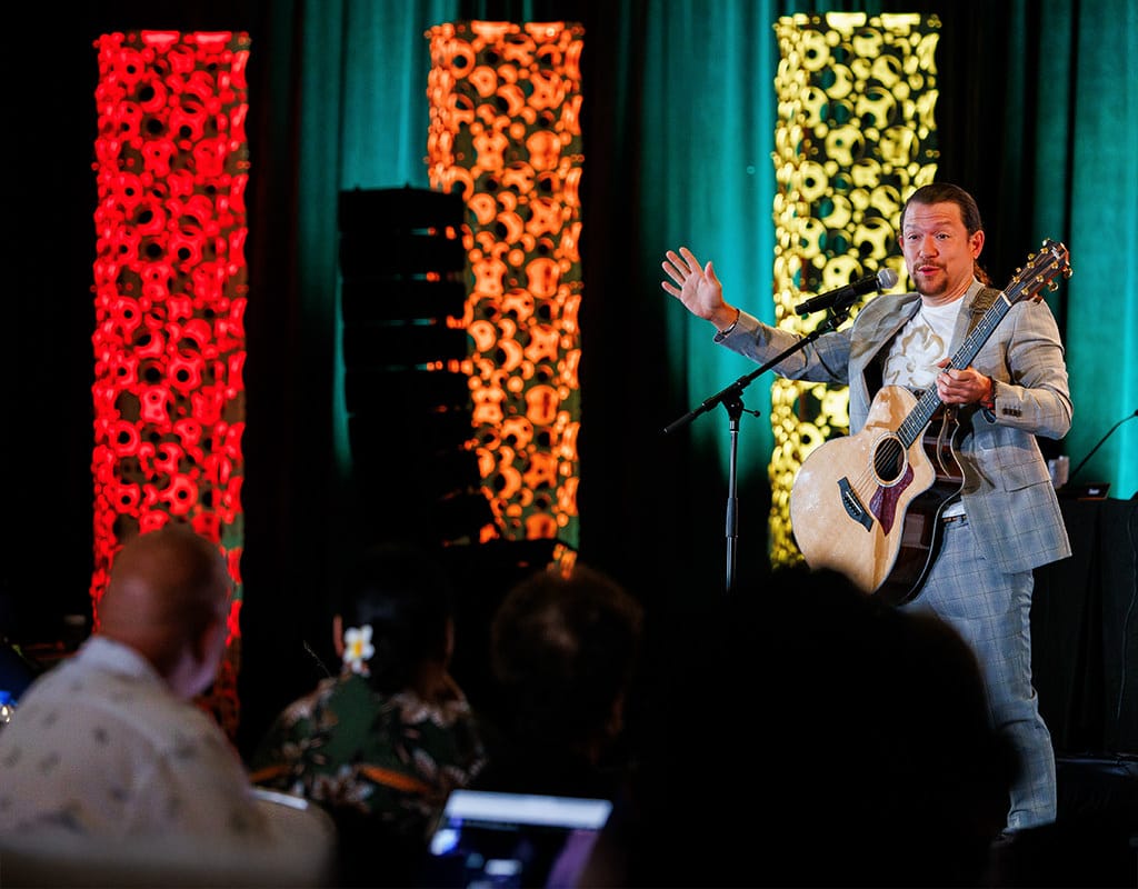 Musician presenting at a Chicago corporate conference, photographed by Chicago corporate event photographer Tori Soper.