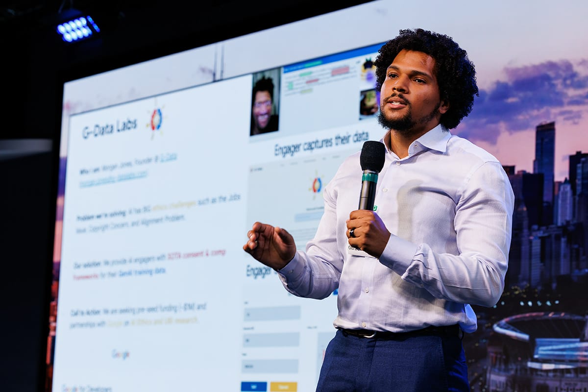Speaker presenting in front of a live audience, photographed by Chicago corporate event photographer Tori Soper.